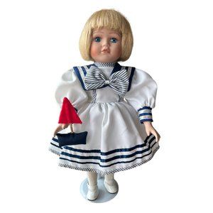 Vintage Porcelain Doll Dressed in a Sailor Dress 15 Inches Tall - Stand Included